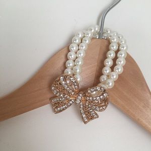 Pearl Braclet with Gold Bow Pendant